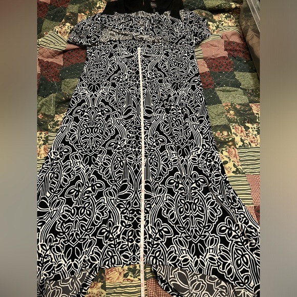 Sleeveless patterned dress with ruffle type top - Picture 11 of 16